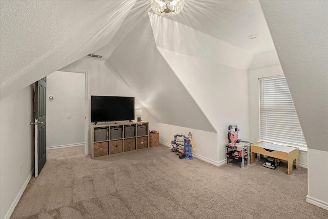210 Sendero Dr, Waxahachie, TX 75165 - playroom featuring vaulted ceiling, carpet, and baseboards