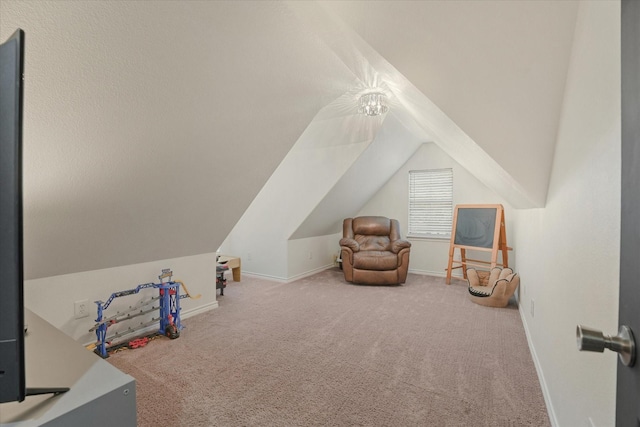 210 Sendero Dr, Waxahachie, TX 75165 - recreation room with carpet flooring, vaulted ceiling, and baseboards