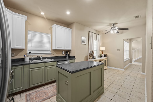210 Sendero Dr, Waxahachie, TX 75165 - kitchen featuring a sink, green cabinetry, white cabinets, ceiling fan, and recessed lighting