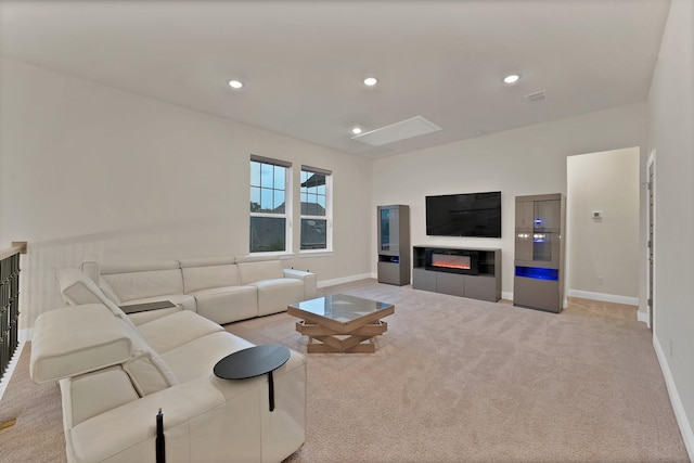 1306 Blue Lake Blvd, Arlington, TX 76005 - living area featuring light colored carpet, a glass covered fireplace, baseboards, and recessed lighting