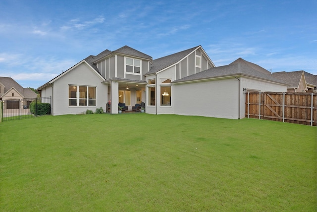 1306 Blue Lake Blvd, Arlington, TX 76005 - rear view of property with stucco siding