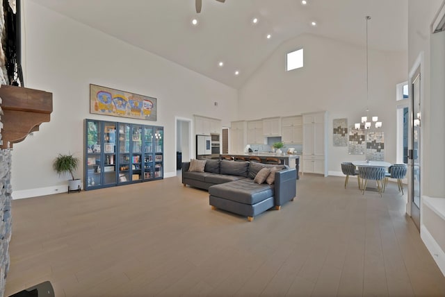 1306 Blue Lake Blvd, Arlington, TX 76005 - living area featuring high vaulted ceiling, a chandelier, light wood finished floors, recessed lighting, and baseboards