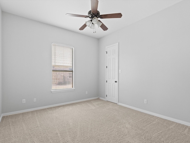 1105 Crown Valley Dr, Weatherford, TX 76087 - spare room with light carpet, baseboards, and a ceiling fan