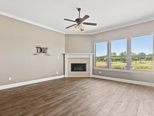 1105 Crown Valley Dr, Weatherford, TX 76087 - unfurnished living room featuring wood finished floors, ornamental molding, and baseboards