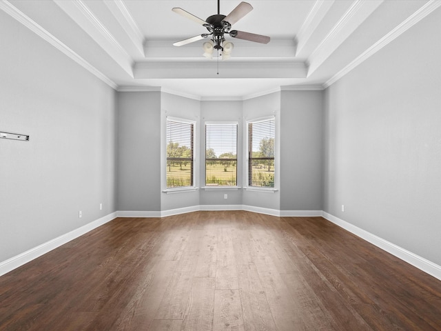 1105 Crown Valley Dr, Weatherford, TX 76087 - unfurnished room with a tray ceiling, wood finished floors, ceiling fan, crown molding, and baseboards