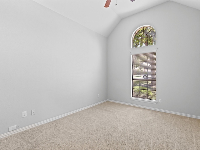 1105 Crown Valley Dr, Weatherford, TX 76087 - empty room with ceiling fan, vaulted ceiling, carpet floors, and baseboards