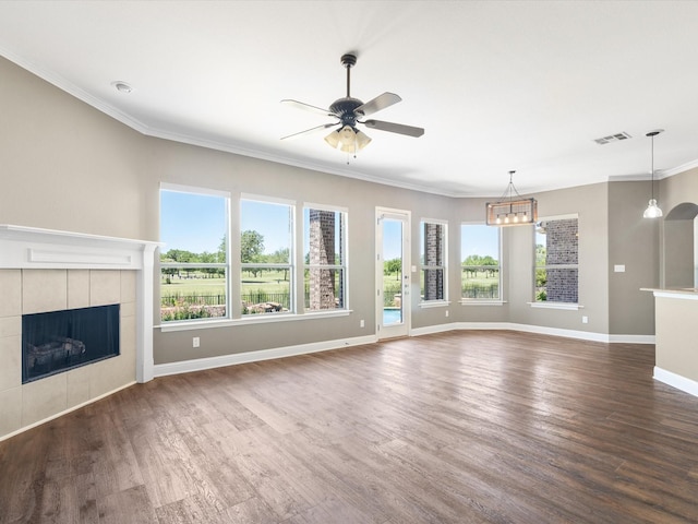 1105 Crown Valley Dr, Weatherford, TX 76087 - unfurnished living room with a ceiling fan, baseboards, wood finished floors, a fireplace, and ornamental molding