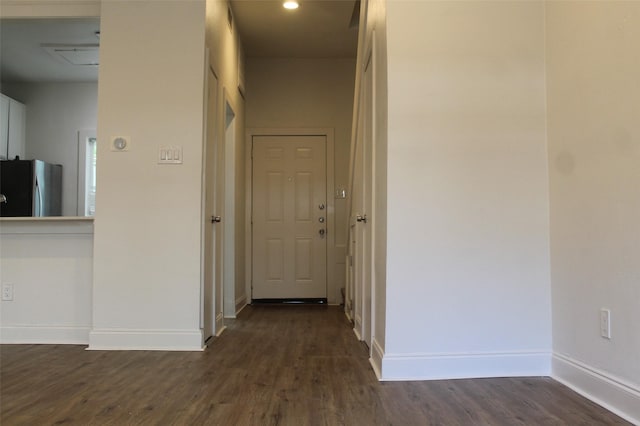 2807 Throckmorton St Unit 101, Dallas, TX 75219 - hall with dark wood-style floors and baseboards