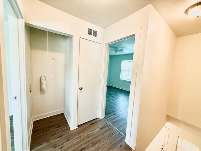 2807 Throckmorton St Unit 101, Dallas, TX 75219 - hallway with dark wood finished floors and baseboards