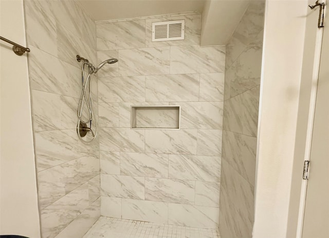 2807 Throckmorton St Unit 101, Dallas, TX 75219 - bathroom featuring a tile shower