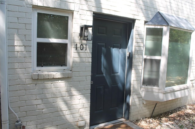 2807 Throckmorton St Unit 101, Dallas, TX 75219 - view of exterior entry with brick siding