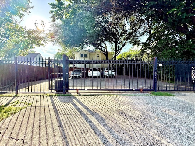 2807 Throckmorton St Unit 101, Dallas, TX 75219 - gate featuring a fenced front yard