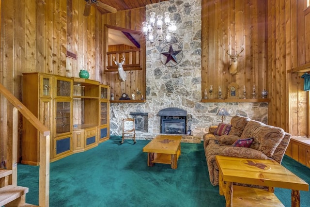 13220 Briar Rd, Azle, TX 76020 - carpeted living area featuring stairs, wooden walls, a stone fireplace, and wood ceiling