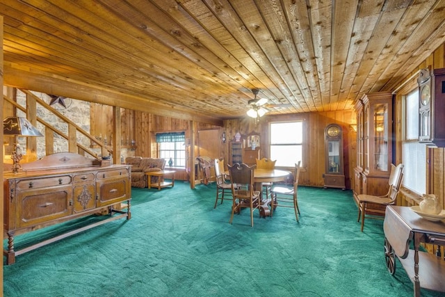 13220 Briar Rd, Azle, TX 76020 - dining room with carpet, wood walls, wooden ceiling, plenty of natural light, and ceiling fan