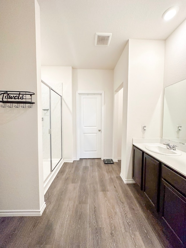 3225 Conley Ct, Mesquite, TX 75126 - hall with a sink, wood finished floors, and baseboards