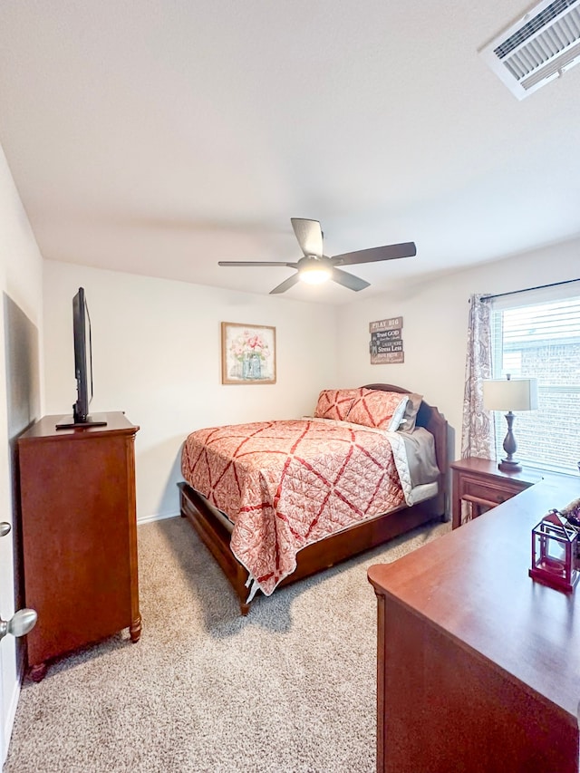 3225 Conley Ct, Mesquite, TX 75126 - bedroom featuring light carpet and a ceiling fan