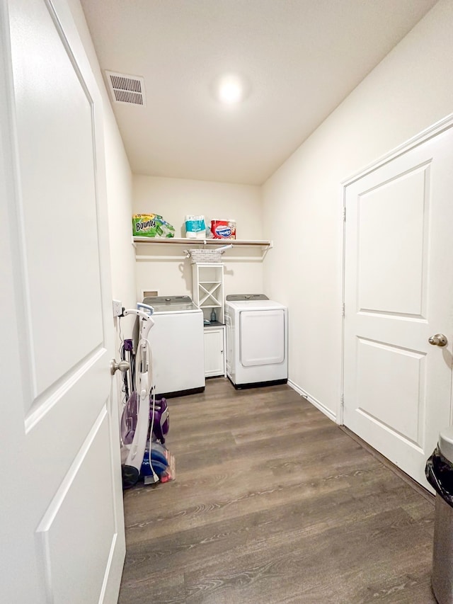 3225 Conley Ct, Mesquite, TX 75126 - laundry area featuring washing machine and dryer and wood finished floors