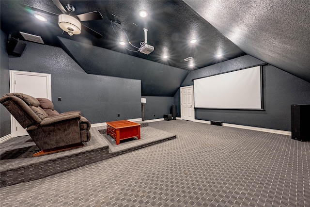6296 Fm 1256, Mabank, TX 75147 - carpeted home theater with vaulted ceiling, baseboards, and a textured ceiling
