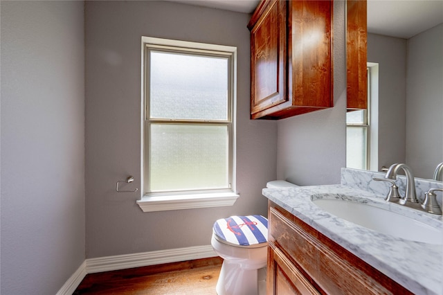 6296 Fm 1256, Mabank, TX 75147 - half bath featuring toilet, wood finished floors, vanity, and baseboards