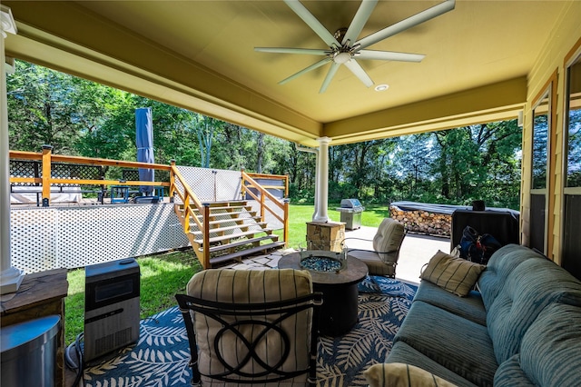 6296 Fm 1256, Mabank, TX 75147 - view of patio / terrace featuring a ceiling fan, a deck, a grill, an outdoor living space with a fire pit, and stairs