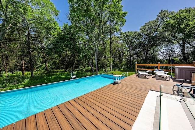 6296 Fm 1256, Mabank, TX 75147 - outdoor pool with a deck and view of wooded area