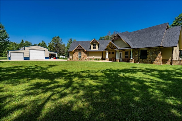6296 Fm 1256, Mabank, TX 75147 - view of front of house with stone siding, an outdoor structure, a detached garage, and a front yard