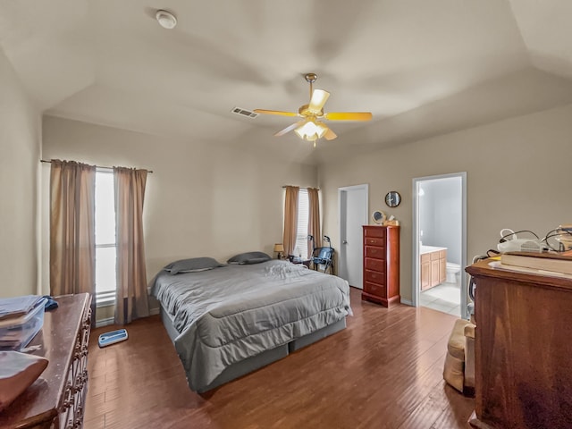 301 Quail Run Rd, Red Oak, TX 75154 - bedroom featuring hardwood / wood-style flooring, connected bathroom, and a ceiling fan