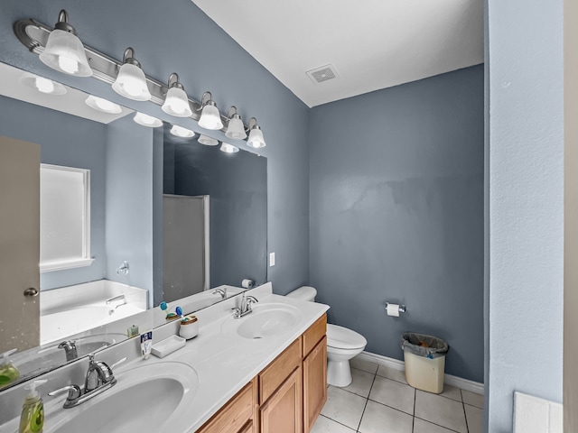 301 Quail Run Rd, Red Oak, TX 75154 - full bath with toilet, double vanity, tile patterned flooring, a bath, and a shower