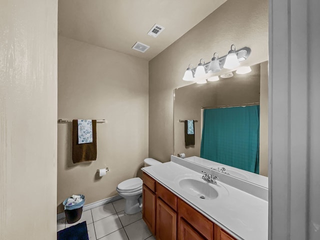 301 Quail Run Rd, Red Oak, TX 75154 - full bathroom with toilet, vanity, tile patterned flooring, a shower with shower curtain, and baseboards