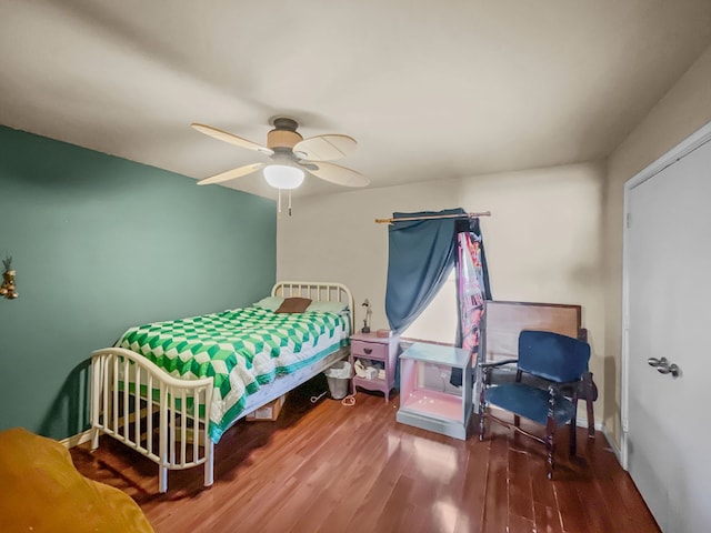 301 Quail Run Rd, Red Oak, TX 75154 - bedroom with wood finished floors and ceiling fan