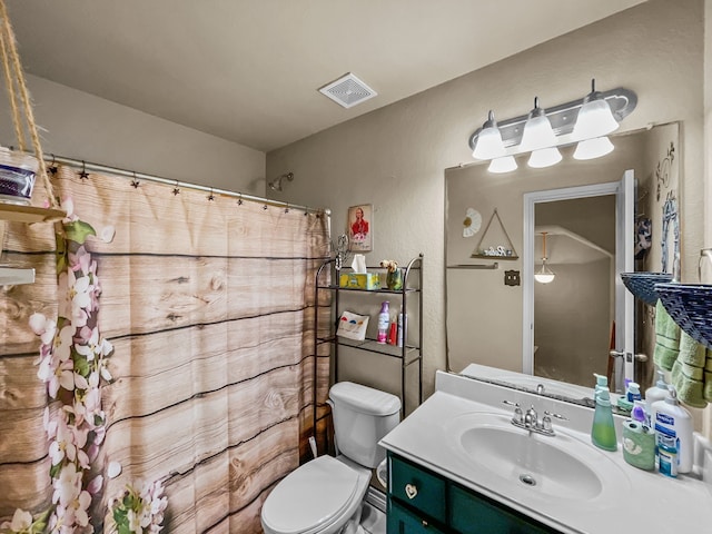 301 Quail Run Rd, Red Oak, TX 75154 - bathroom featuring toilet, vanity, and a shower with shower curtain