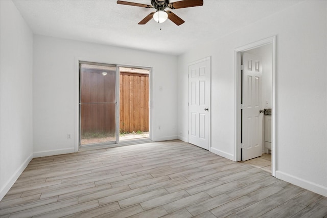 5409 Queens Ct, Lake Dallas, TX 75065 - unfurnished bedroom with light wood-type flooring, baseboards, and ceiling fan