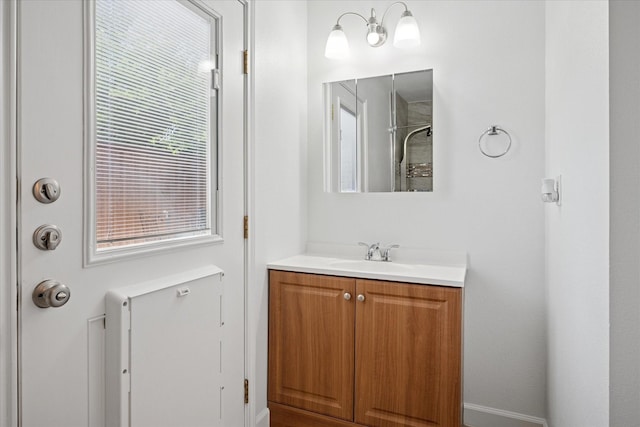 5409 Queens Ct, Lake Dallas, TX 75065 - full bathroom with vanity, a shower, and baseboards