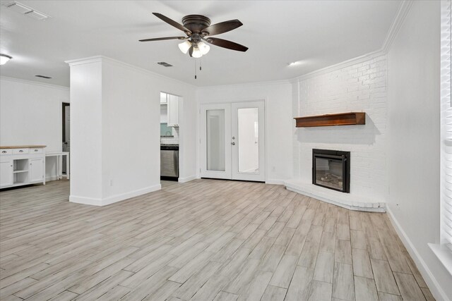 5409 Queens Ct, Lake Dallas, TX 75065 - unfurnished living room with ceiling fan, light wood-type flooring, baseboards, ornamental molding, and a fireplace