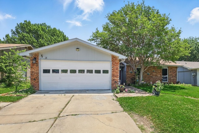 7028 Whitewood Dr, Fort Worth, TX 76137 - single story home with brick siding, a front yard, driveway, and a garage