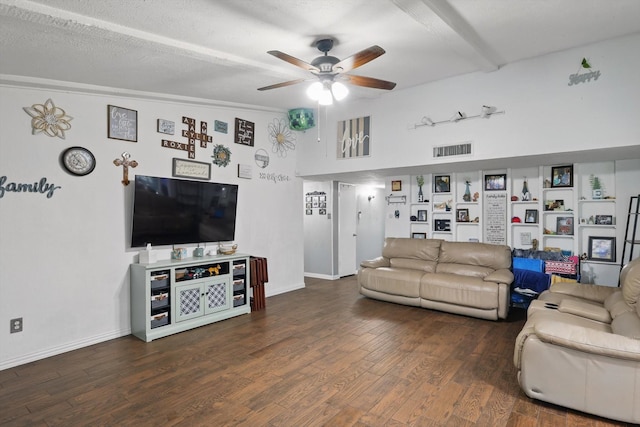 7028 Whitewood Dr, Fort Worth, TX 76137 - living room featuring a ceiling fan, wood finished floors, beam ceiling, and baseboards