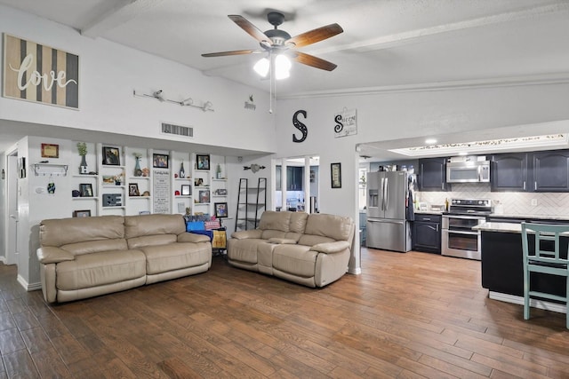 7028 Whitewood Dr, Fort Worth, TX 76137 - living room featuring a high ceiling, ceiling fan, wood finished floors, and beamed ceiling