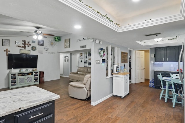 7028 Whitewood Dr, Fort Worth, TX 76137 - living area with a tray ceiling, a ceiling fan, dark wood-type flooring, and baseboards