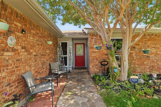 7028 Whitewood Dr, Fort Worth, TX 76137 - entrance to property featuring brick siding and a patio
