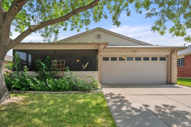 415 Blueberry Hill Ln, Mansfield, TX 76063 - ranch-style house featuring concrete driveway, an attached garage, a front yard, and a sunroom