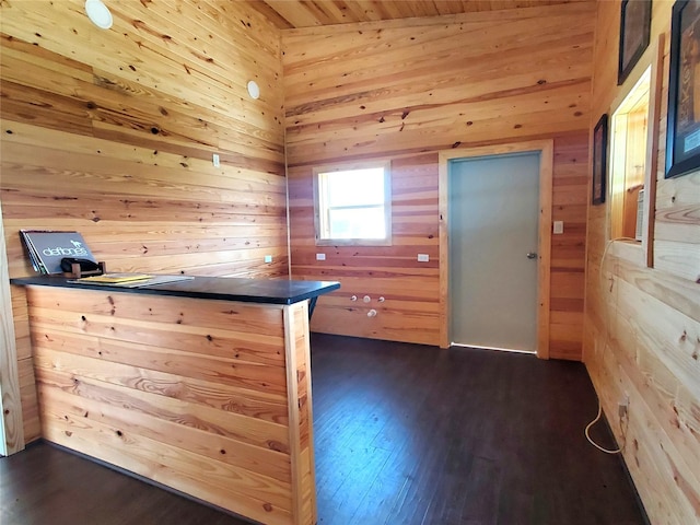 291 County Road 4833, Leonard, TX 75452 - kitchen featuring wooden walls, dark wood-style flooring, dark countertops, and wooden ceiling