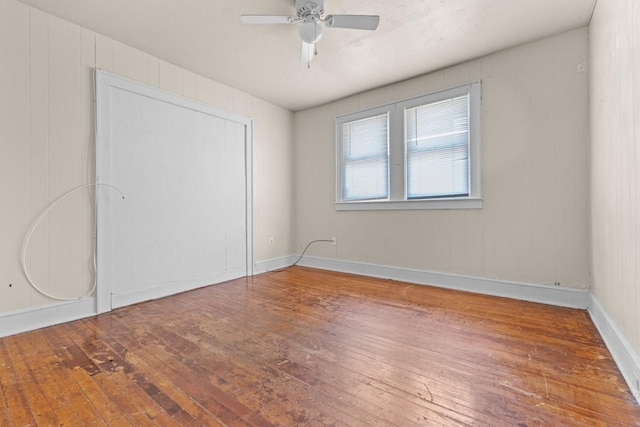 314 Dunn St, Waxahachie, TX 75165 - unfurnished bedroom with wood-type flooring, a ceiling fan, baseboards, and a closet