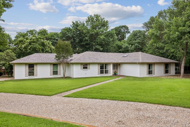 780 River Oaks Dr, Fairview, TX 75069 - view of front of property with a front yard, a shingled roof, and brick siding