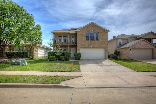 1057 Castle Top Dr, Fort Worth, TX 76052 - traditional home featuring brick siding, a front yard, driveway, a garage, and central AC