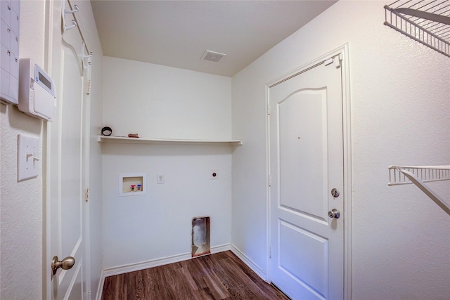 1057 Castle Top Dr, Fort Worth, TX 76052 - washroom with wood finished floors, washer hookup, electric dryer hookup, and baseboards