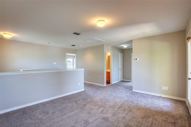 1057 Castle Top Dr, Fort Worth, TX 76052 - carpeted spare room with baseboards and attic access