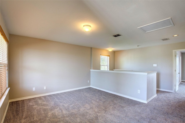 1057 Castle Top Dr, Fort Worth, TX 76052 - carpeted spare room with baseboards and attic access