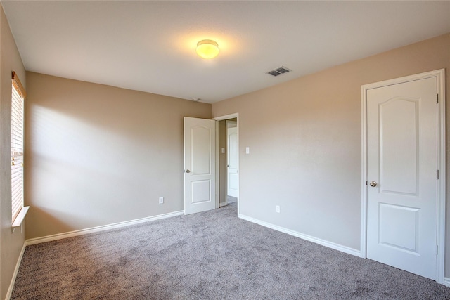 1057 Castle Top Dr, Fort Worth, TX 76052 - unfurnished bedroom featuring carpet and baseboards