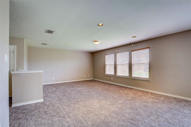 1057 Castle Top Dr, Fort Worth, TX 76052 - spare room with carpet flooring, baseboards, and recessed lighting