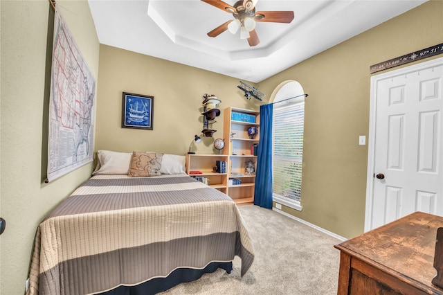 121 Sanchez Creek Ct, Weatherford, TX 76088 - bedroom with carpet flooring, a raised ceiling, ceiling fan, and baseboards